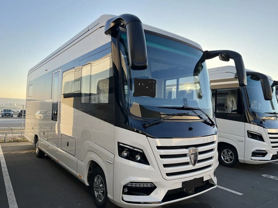 Two detailed motorhomes
